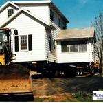 Transported Liberty Bible Church's mission house to a new location and built a new foundation