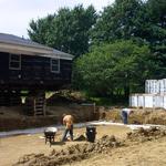 Transporting a home onto a custom built new foundation with a basment