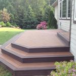 Two-tone Trex composite decking featured on this beautiful backyard deck.