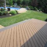 Two-tone Trex composite decking featured on this beautiful backyard deck.