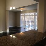 View of open concept living room from kitchen sink
