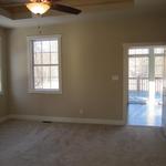 Master bedroom suite adjacent to living room nook and gorgeous back deck